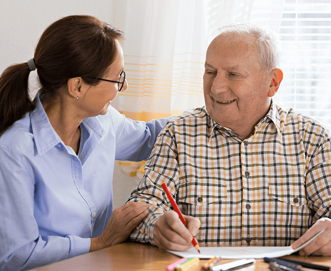 woman helping senior