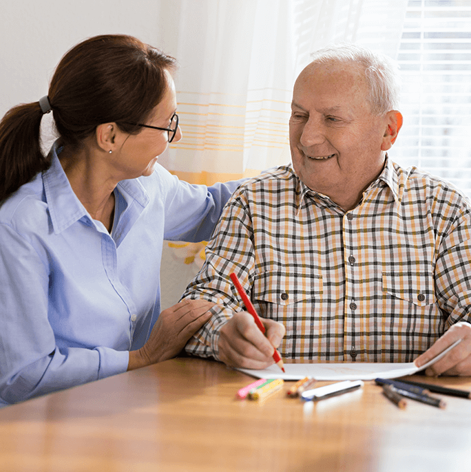 woman helping senior