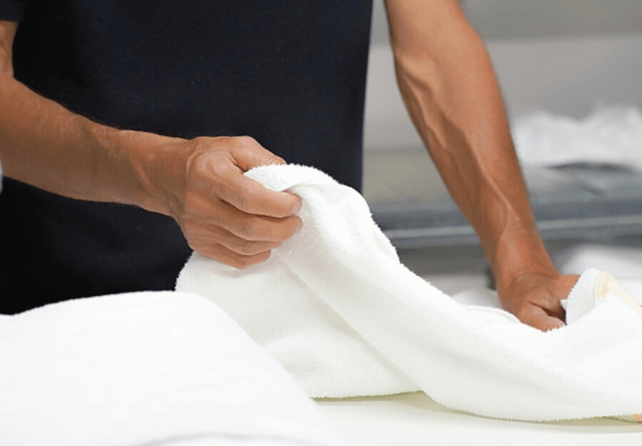 Employee doing linen services