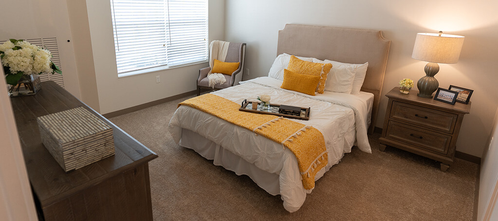 Cozy senior bedroom with yellow accents